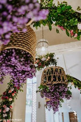 CAFE WITH PURPLE FLOWERS HANGING UP
