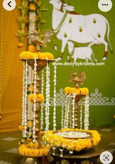 In the living room, elevate the festive spirit by arranging colorful flowers in earthen pots