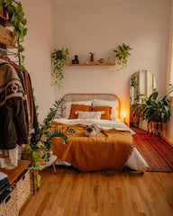 Turn your bedroom into a calming green retreat with the gentle charm of indoor plants.