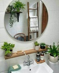 Turn your bathroom into a spa-like escape with the freshness of indoor plants.