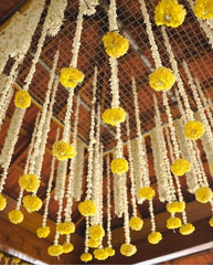 diwali  Decoration of Flowers – a timeless way to welcome light and joy! Strings of marigold, petals of rose, and fragrant jasmine are woven into stunning patterns
