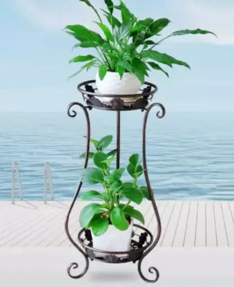 What it is  A compact, two-level stand that layers greenery without taking floor space—perfect for pairing a trailing vine with an upright showplant.